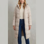 Women's Cozy Longline Puffer Jacket – Clover — variant_lifestyle_v_b7efc41a3d__langley-cozy-longline-puffer-jacket-for-women_lifestyle_full_body_standing_01.webp