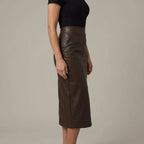 Women's High Waisted Faux Leather Midi Skirt - Palomine — velloura-elegant-sculpted-faux-leather-midi-skirt_lifestyle_natural_03_02.webp