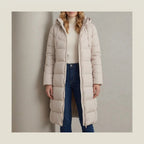 Women's Cozy Longline Puffer Jacket – Clover — variant_lifestyle_v_b7efc41a3d__langley-cozy-longline-puffer-jacket-for-women_lifestyle_leaning_wall_05.webp