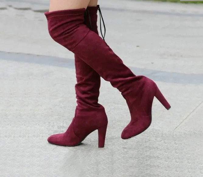 Bottes cuissardes à talons rouge